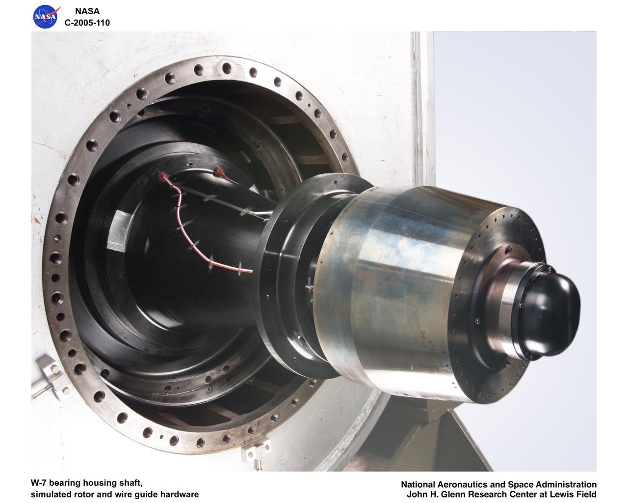 Ultra-Efficient Engine Technology (UEET), Proof of Concept Compressor, W-7 bearing housing shaft, simulated rotor wire guide hardware