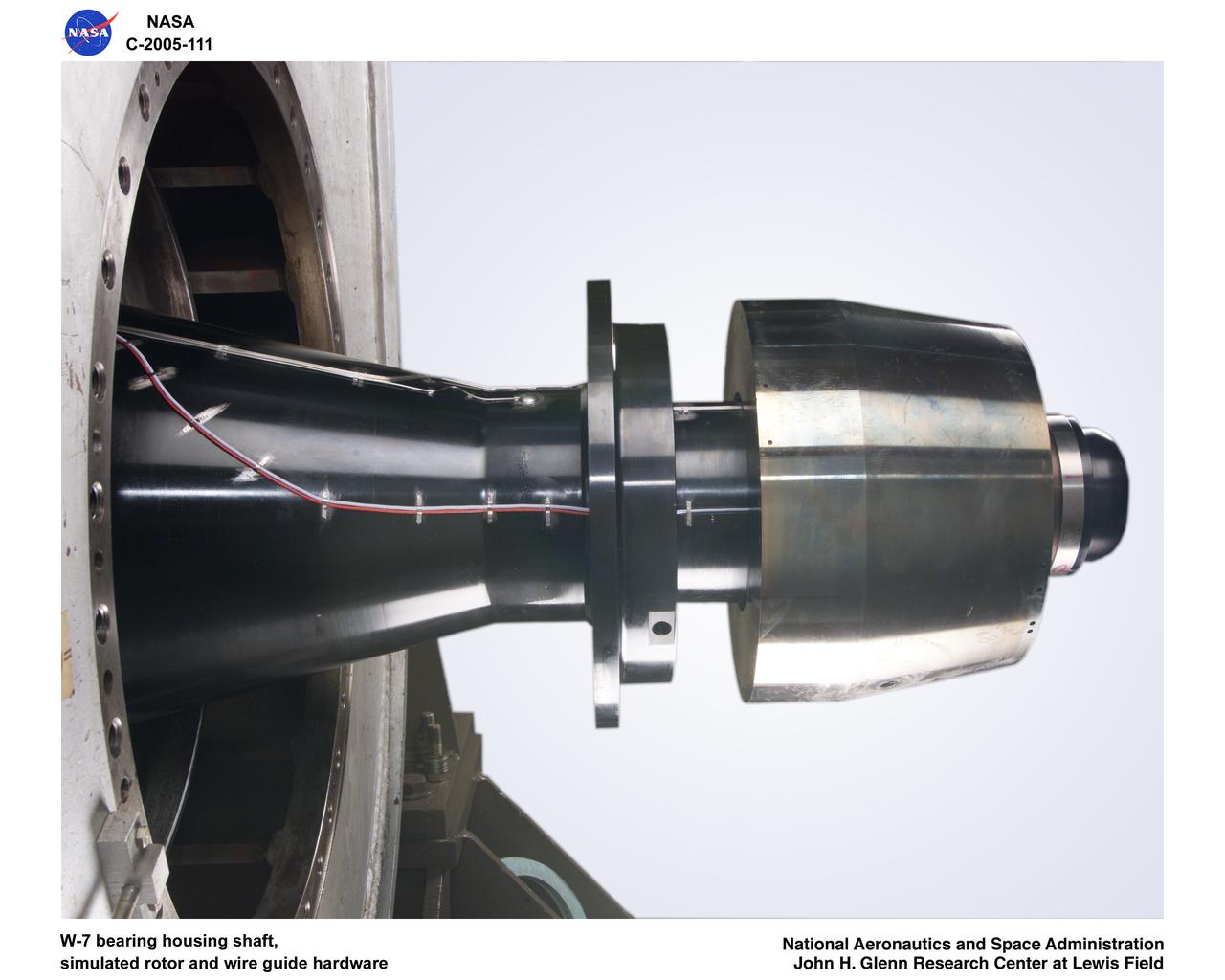 Ultra-Efficient Engine Technology (UEET), Proof of Concept Compressor, W-7 bearing housing shaft, simulated rotor wire guide hardware