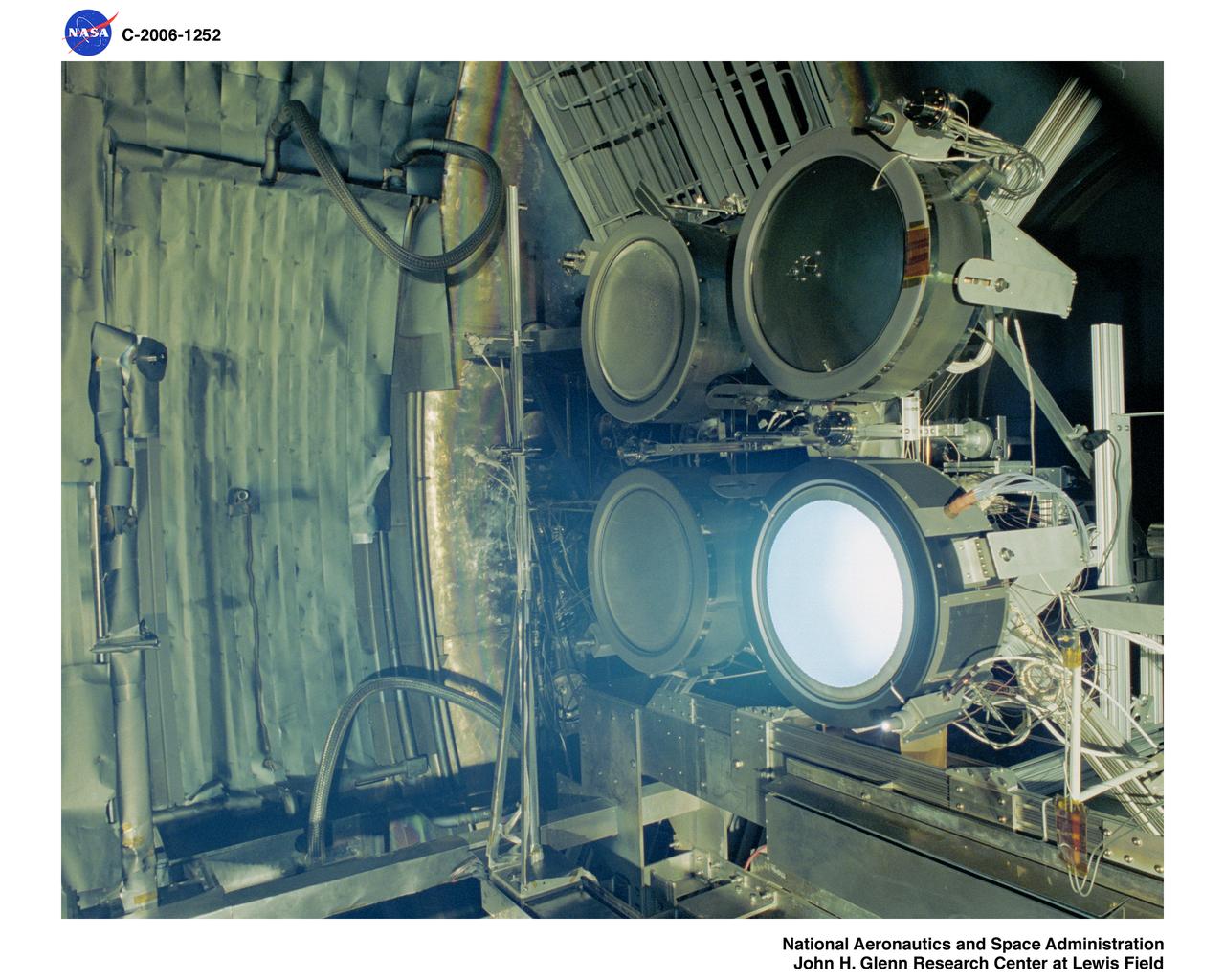 Performance Acceptance Test of a prototype-model NEXT (NASA Evolutionary Xenon Thruster) ion engine that was delivered to NASA Glenn Research Center by Aerojet. The test dates were May 10 - May 17, 2006. The test was conducted in the Vacuum Facility 6 test facility located in the Electric Power Laboratory. The test successfully demonstrated the PM manufacturing process carried out by Aerojet under the guidance of NASA Glenn Research Center and PM1 acceptable functionality