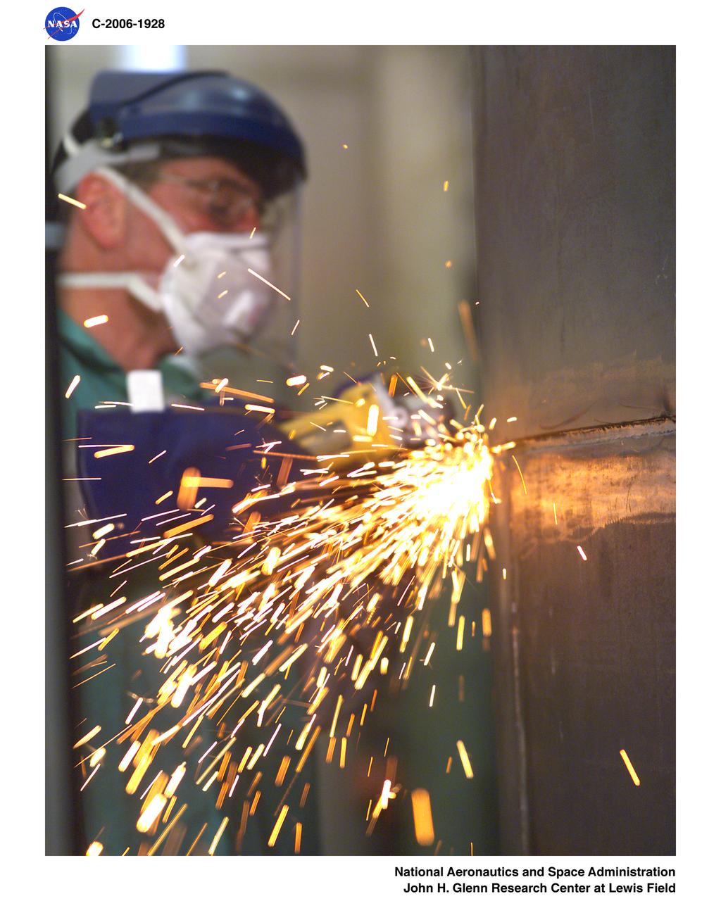 Fabrication of the Ares-1 mock-up showing welding and grinding operations. This is part of the Constellation project