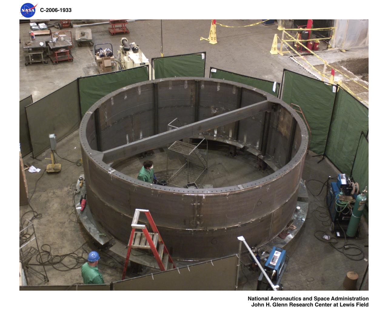 Fabrication of the Ares-1 mock-up showing welding and grinding operations.  This is part of the Constellation project