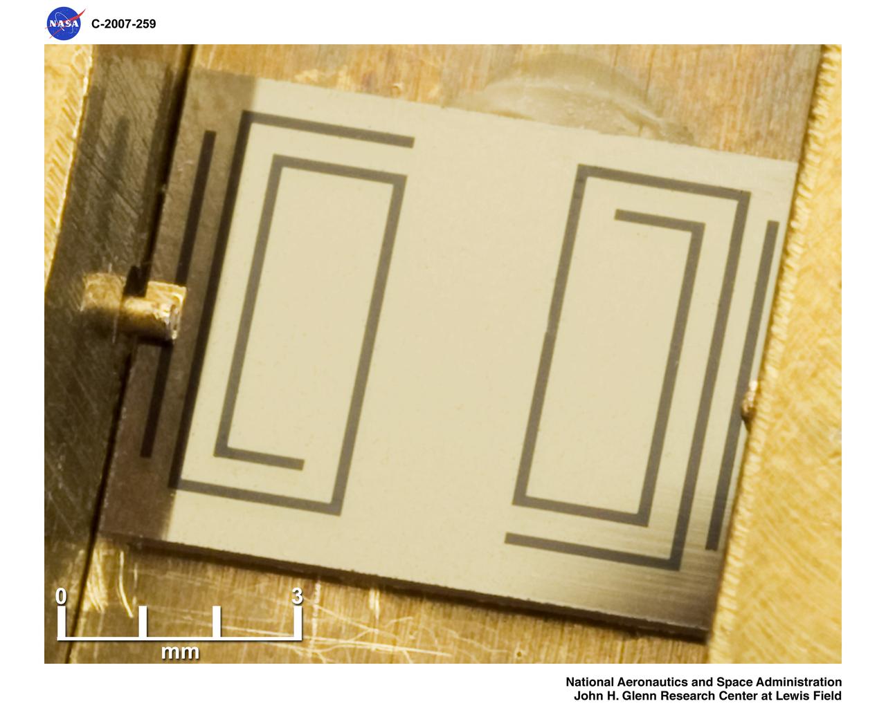 High Temperature Superconductor Microstrip Coupled Filters with mm scale