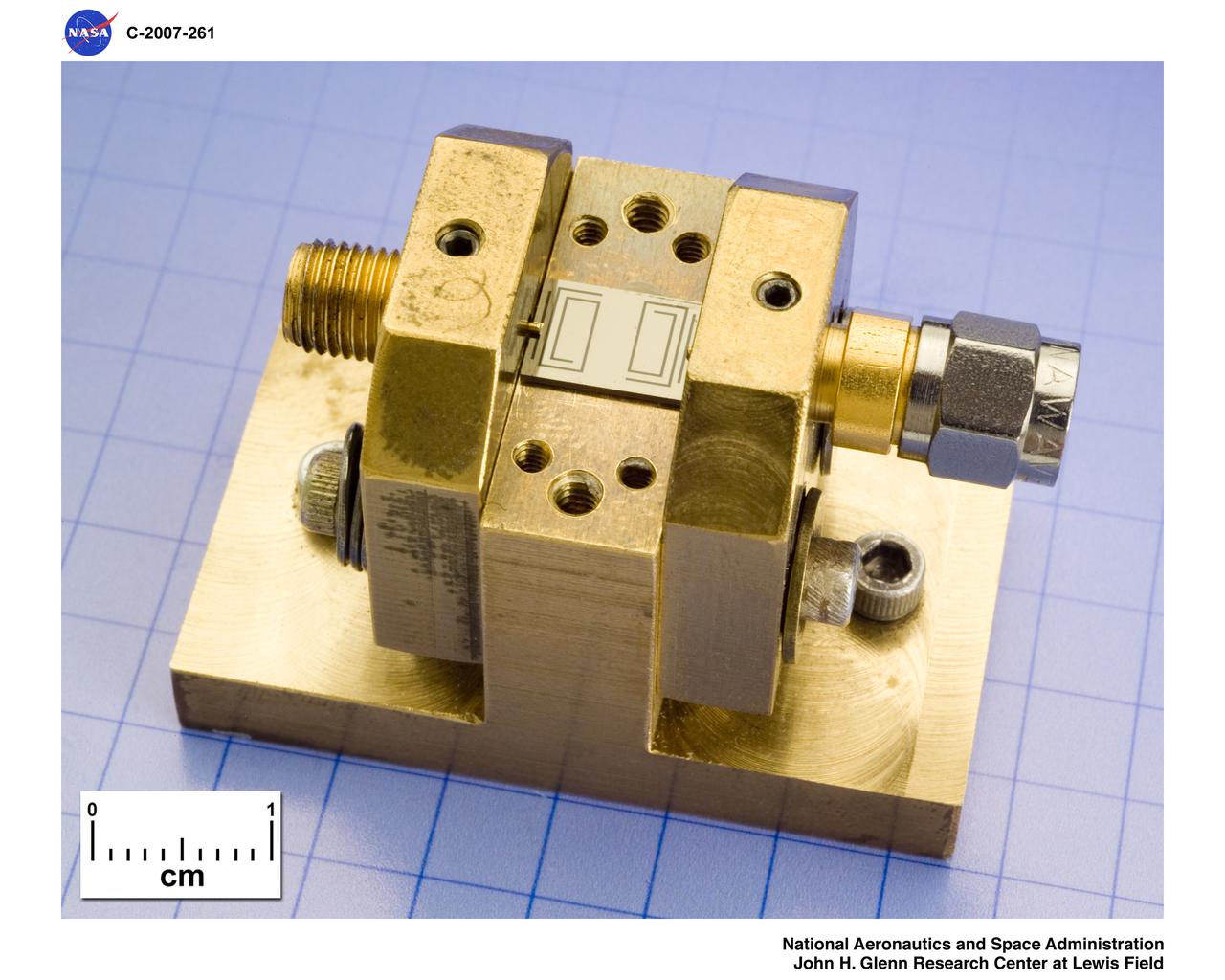 High Temperature Superconductor Microstrip Coupled Filters with mm scale