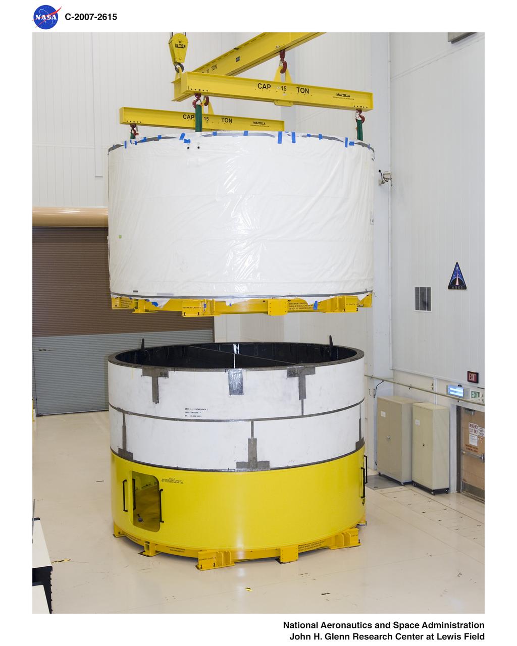 Ares 1-X segment US2 being transported from building 50 to building 333