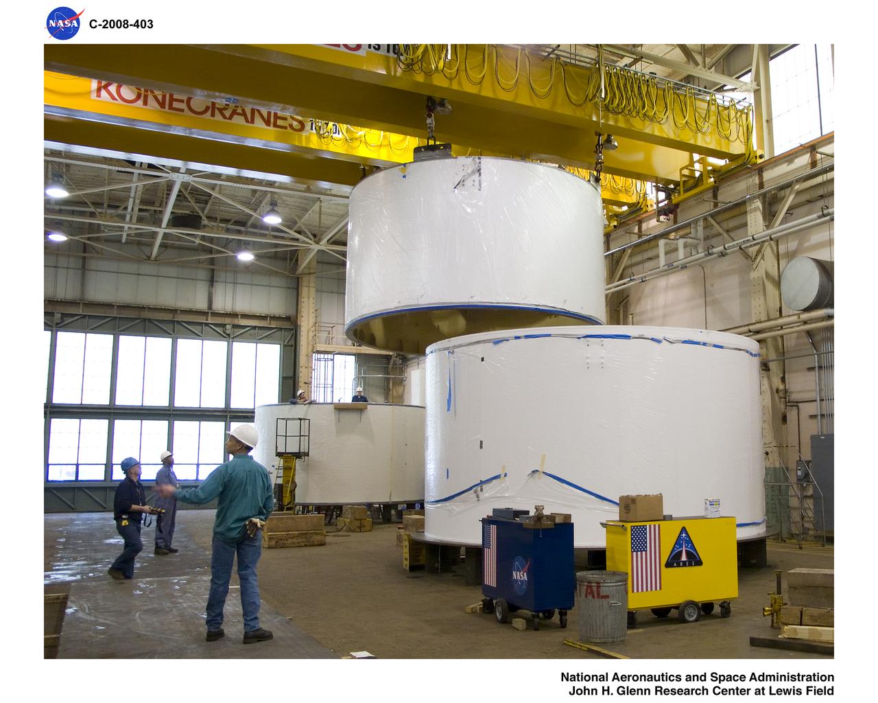 Inside BLDG.50, US4 is being lifted and will be stacked on US3.