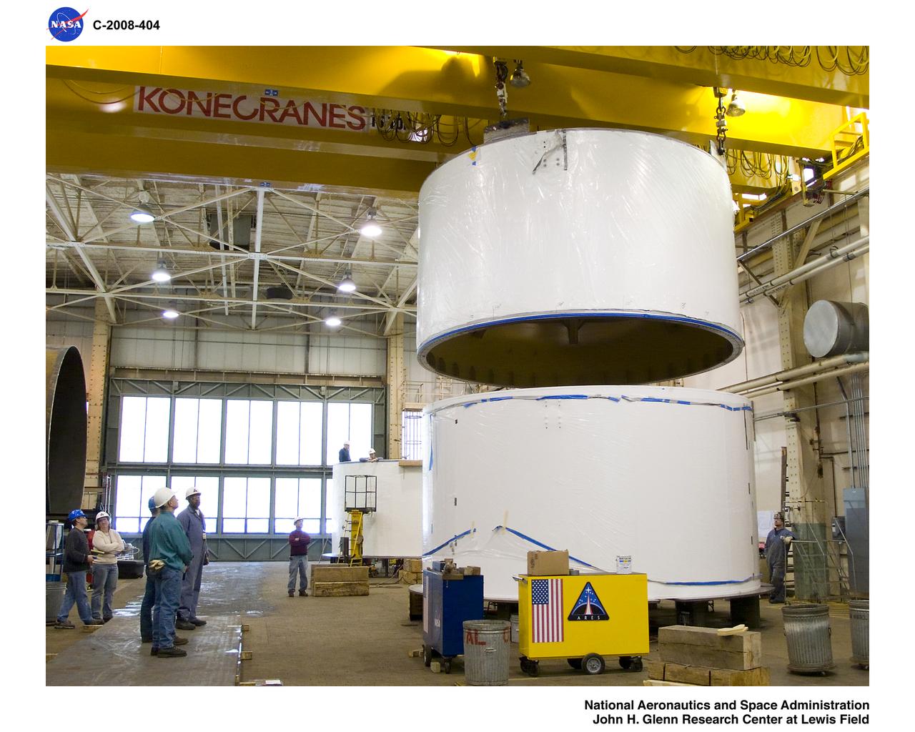 Inside BLDG.50, US4 is being lifted and will be stacked on US3.