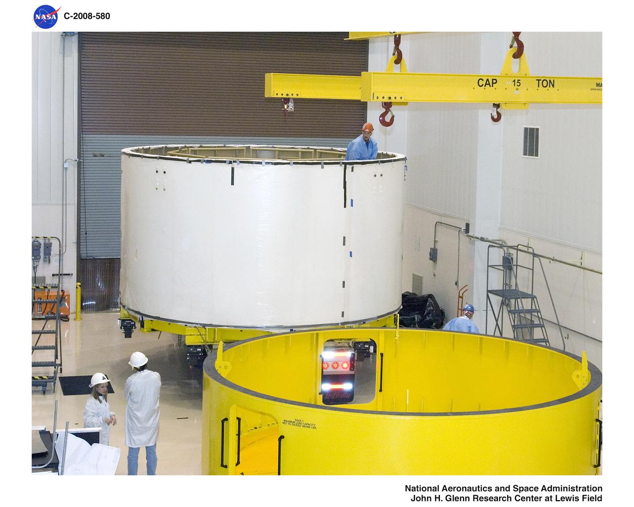 Ares 1-X Segment US-3 being lifted from the truck in Building 333