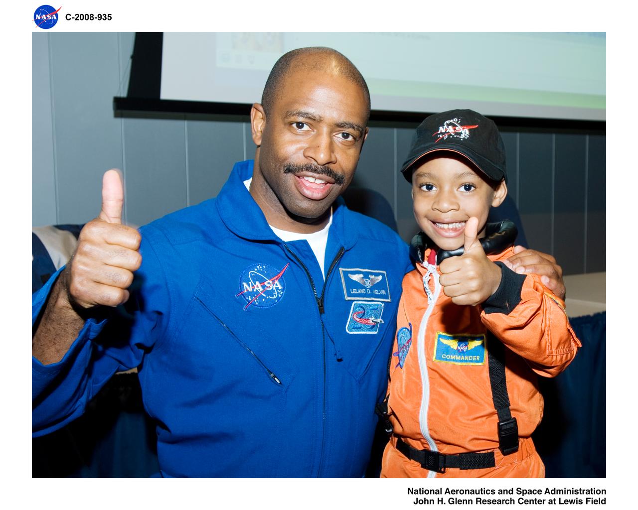 Astronaut Leland Melvin, Taron Austin