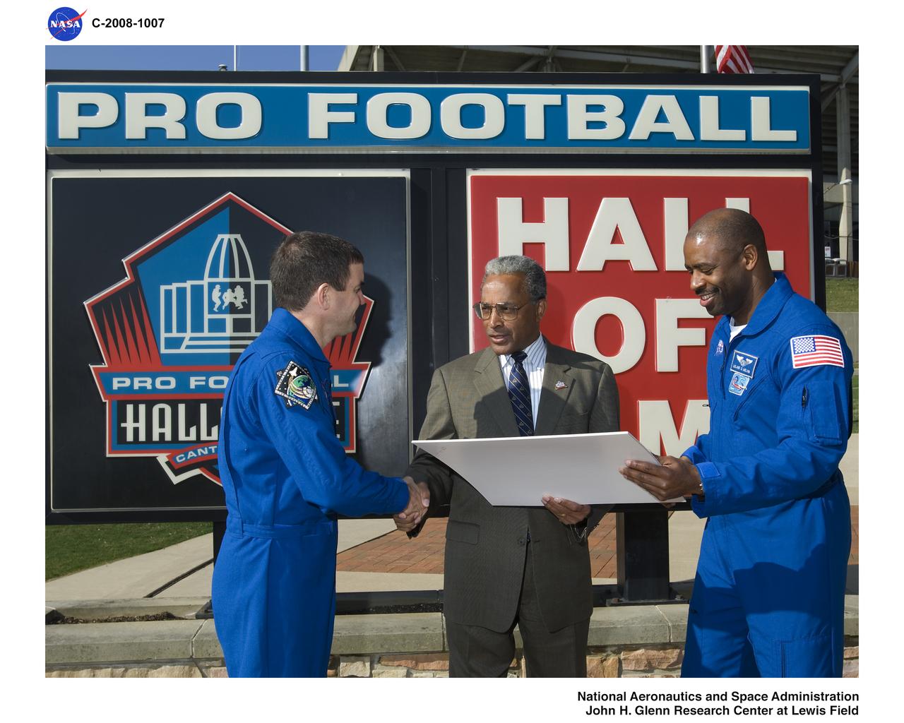 STS-122 Crew Members visit the Pro Football Hall of Fame in Canton Ohio and present an STS-122 commemorative collage to the Hall of Fame President