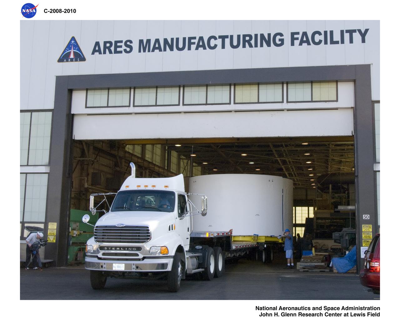 the Super Stack 3 of ARES I-X segments being de-stacked in Building 333 and moved to Building 50