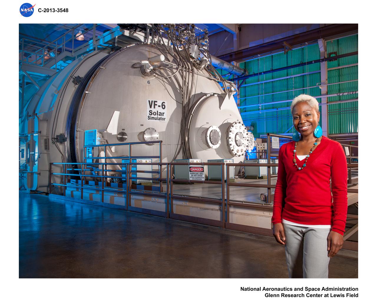 Environmental portrait of Mary Gibson and of Tank 6 (VF-6) Solar Simulator for NASA GRC Web Feature Story