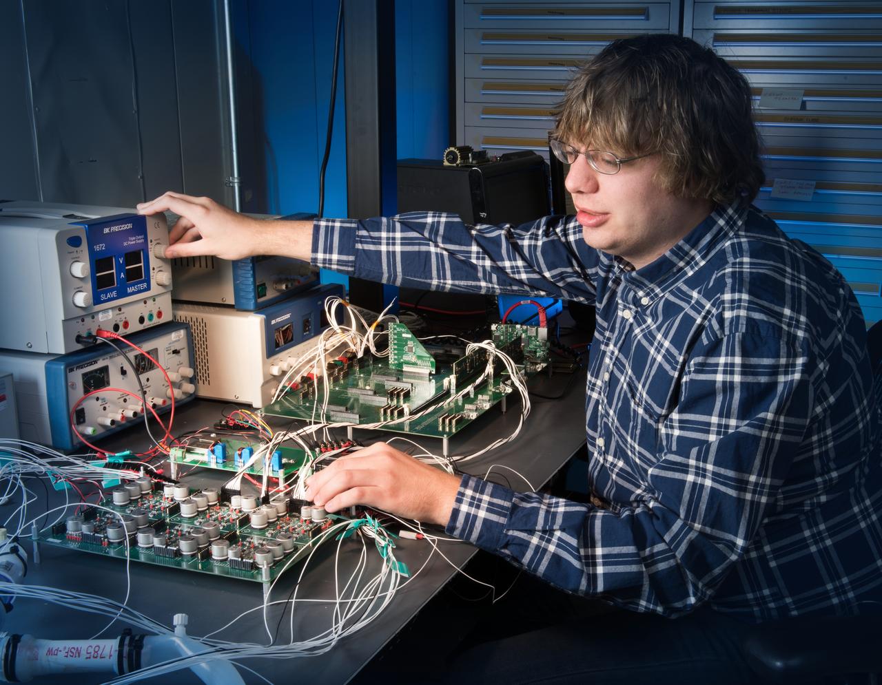 Environmental Portrait of a Telecommunications Engineer with the University of Indiana Heart Pump, Motor Controller Electronics