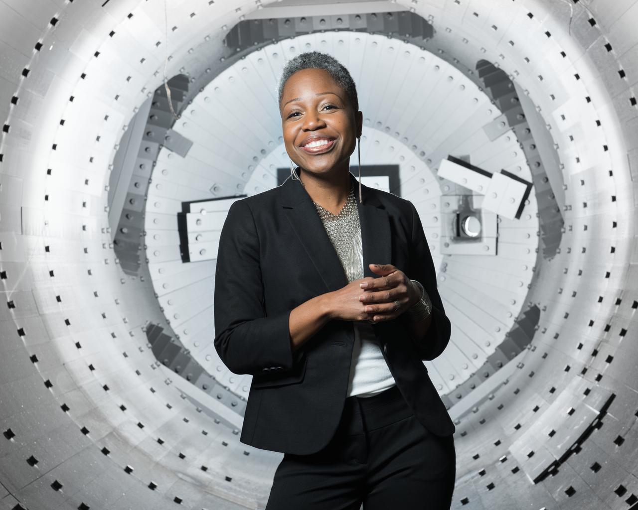 “I am a Black woman in STEM. And when I was growing up, I cannot say that I saw a lot of faces that looked like mine in STEM careers. I had some limited exposure to some notables, like Dr. Mae Jemison. But the names were few and far between of the great scientists or engineers that were Black — let alone Black females. So for me, if anybody sees my picture and says ‘yes, I see someone who looks like me working in STEM’ — that right there is very fulfilling. Just to be seen and to be visible makes a difference.   "I also must provide words of encouragement because being in STEM can be difficult as is, let alone having to face the challenges of being a female in a male-dominated field. Or even being a double minority in the workplace.   "It’s a matter of being really self-assured that you can do it, despite the fact that you’re going to have failures, that you’re going to have setbacks, and that you’re going have people who may not believe in you, for whatever reason. You have to be self-assured that this is what you want to do and that it can be done. This 4’11” Black woman achieved this, not knowing that STEM was going to be my path or that I was going to end up at NASA — I did it, and I believe that you can do it too — but you have to believe it for yourself.”  — Mary Lobo, Director of Office of Technology Incubation and Innovation, Glenn Research Center  The Facility Manager for the Space Simulation Facilities at Glenn Research Center, poses inside Vacuum Facility 16 (VF-16) for an Environmental  Portrait. The lighting used in this portrait depicts the chamber as having an almost white interior when the chamber is actually almost black in color.