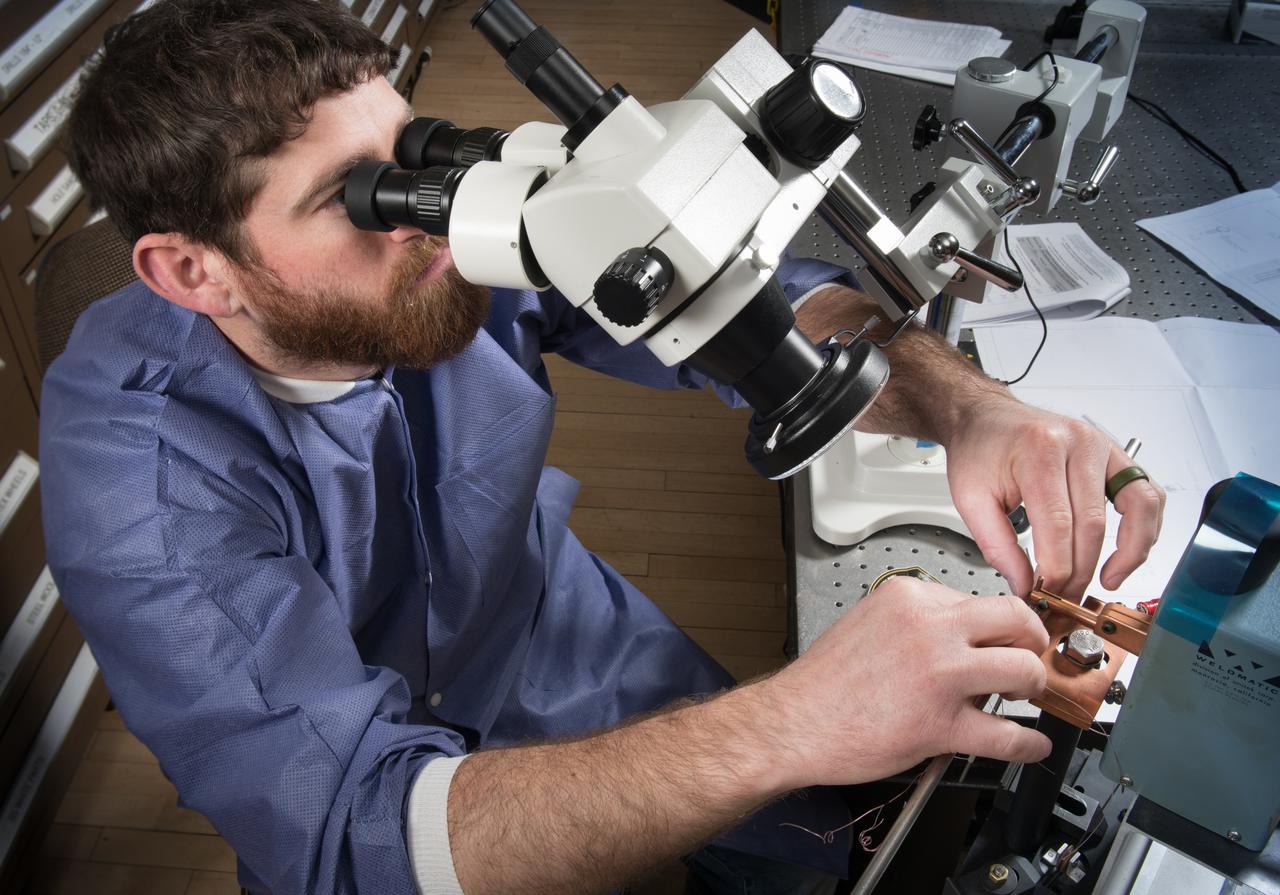 A technician in the Instrumentation Shop during the buildup of Flow Boiling Condensation Experiment, FBCE Micro Gravity Payload, Condensation Module – Heat Transfer, CM-HT, Test Section Hardware Fabrication