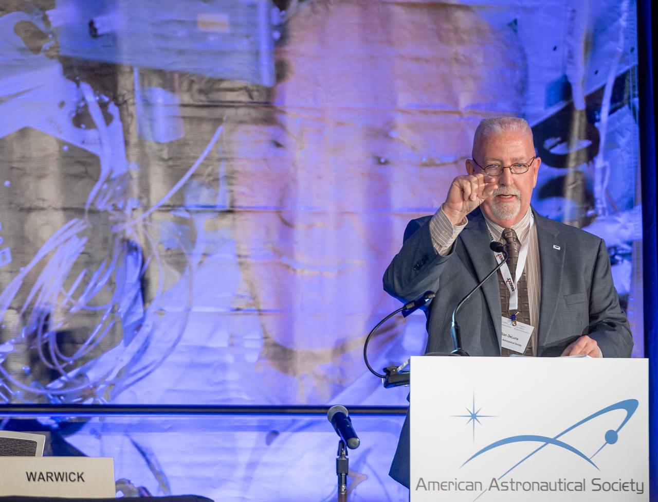 The inaugural Glenn Symposium focused on advancements in aerospace technology including power and propulsion, autonomy and communications, low boom supersonics, hypersonics, and more. Discussion also encompassed humans returning to the moon, including challenges associated with the 2024 mission.