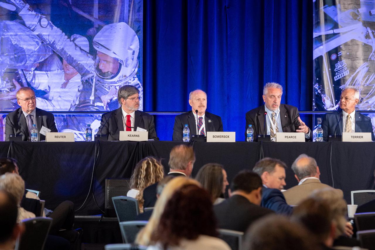 The inaugural Glenn Symposium focused on advancements in aerospace technology including power and propulsion, autonomy and communications, low boom supersonics, hypersonics, and more. Discussion also encompassed humans returning to the moon, including challenges associated with the 2024 mission.