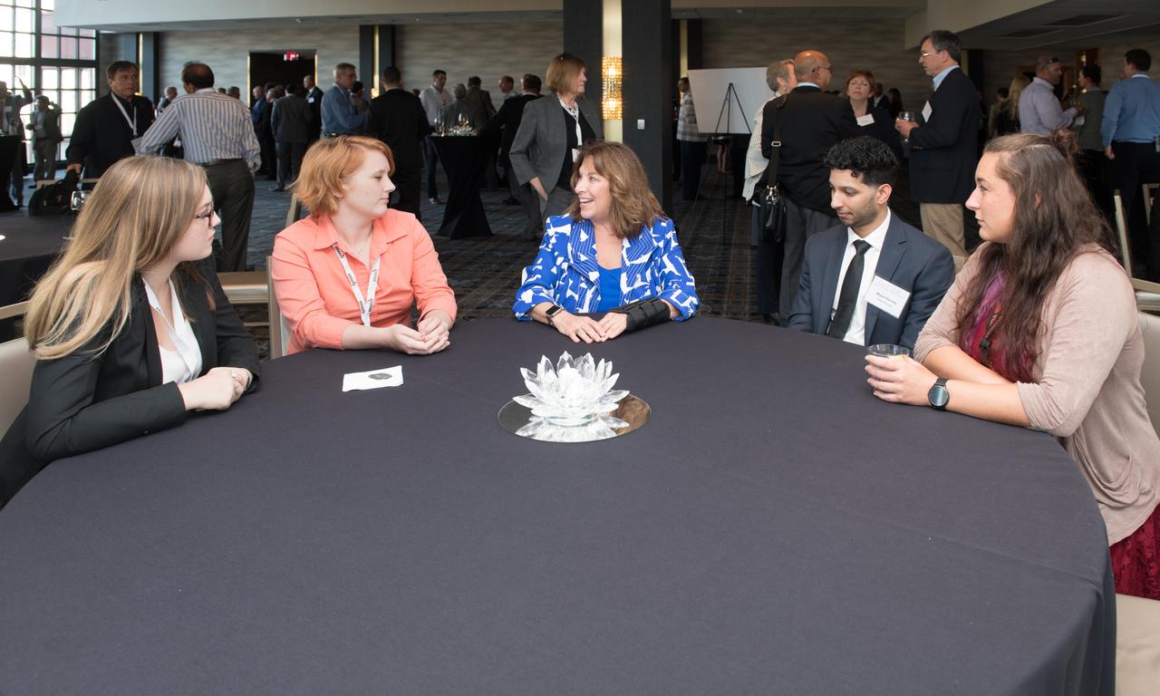 The inaugural Glenn Symposium focused on advancements in aerospace technology including power and propulsion, autonomy and communications, low boom supersonics, hypersonics, and more. Discussion also encompassed humans returning to the moon, including challenges associated with the 2024 mission.