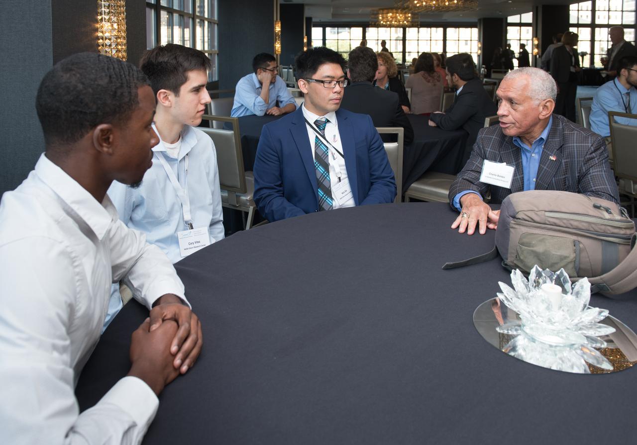 The inaugural Glenn Symposium focused on advancements in aerospace technology including power and propulsion, autonomy and communications, low boom supersonics, hypersonics, and more. Discussion also encompassed humans returning to the moon, including challenges associated with the 2024 mission.