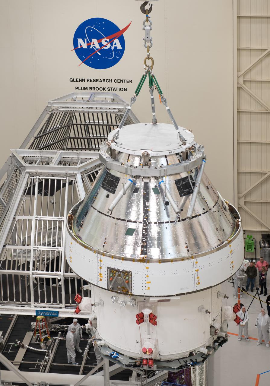 Orion Spacecraft is prepared for Space Environment Testing at the Glenn Research Center, GRC Plum Brook Station, Space Environments Complex, SEC 