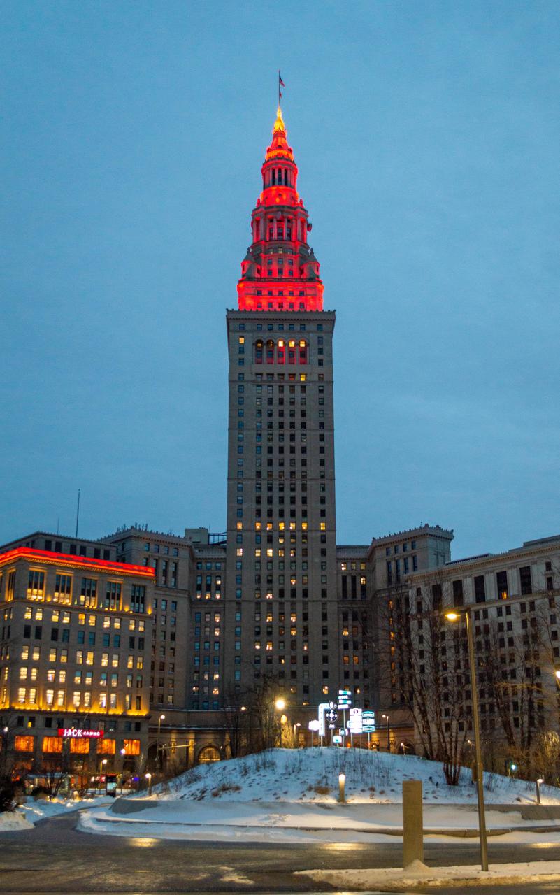 February 17, 2021, The Terminal Tower is illuminated in red to commemorate the Landing of NASA’s Perseverance Rover on the surface of Mars, February 18, 2021.  Terminal Tower is a 52-story, (771 ft), landmark skyscraper located on Public Square in downtown Cleveland, Ohio.  Cleveland is also the home of the NASA Glenn Research Center.