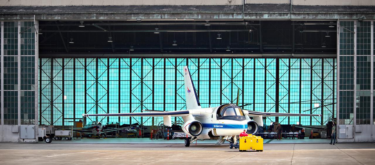 The Lockheed Viking S-3B aircraft is being pulled out of the hangar at Glenn Research Center in preparation for its departure and retirement from service.  This former NAVY aircraft was the last such aircraft still flying.  It has gone to a museum on the west coast.  After leaving service with the NAVY, it came to GRC to be used in aircraft icing experiments.  The swept wings made it suitable for such research as opposed to the straight wings on GRG’s other icing research aircraft, the De Havilland Twin Otter.