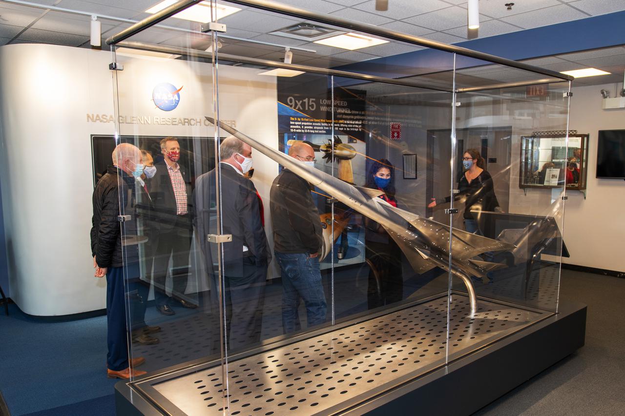 Tour of the Glenn Research Center’s 8x6 Supersonic wind tunnel and the 9x15 Low Speed wind tunnels by senior management.  The tour group is the Dayton Development Coalition representing JobsOhio.  Photo was taken in the lobby of building 54 with the display of the QueSST (Quiet, Efficient SuperSonic Transport) model in the foreground.