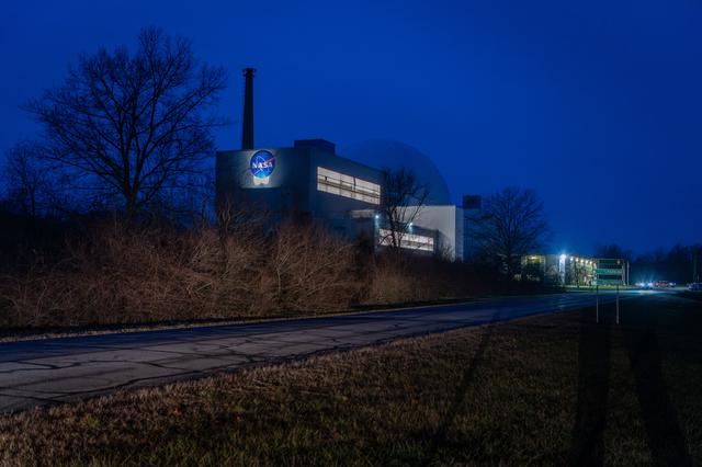 NASA image: Evening photo of the Space Experiments Complex (SEC) at Armstron