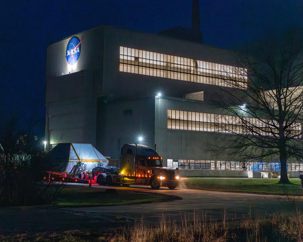 Evening photo of the Space Experiments Complex in the evening of the arrival of the Orion ETA (Environmental Test Article) having been shipped from Florida by truck. The Orion ETA flew on Artemis I and will undergo testing of the docking module jettison and the forward by cover jettison in preparation of the Artemis II launch.