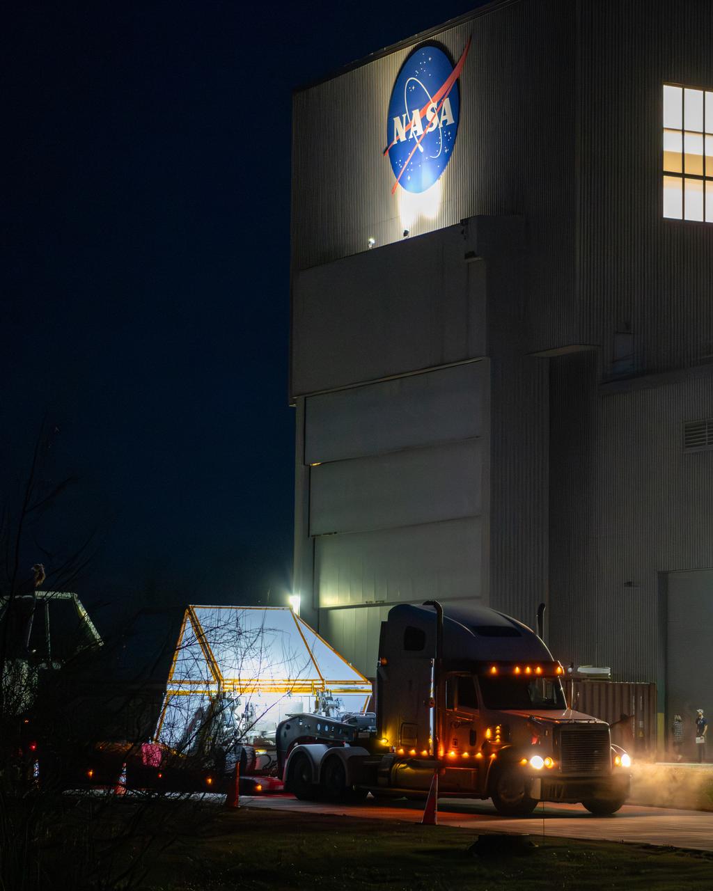 Evening photo of the Space Experiments Complex in the evening of the arrival of the Orion ETA (Environmental Test Article) having been shipped from Florida by truck. The Orion ETA flew on Artemis I and will undergo testing of the docking module jettison and the forward by cover jettison in preparation of the Artemis II launch.