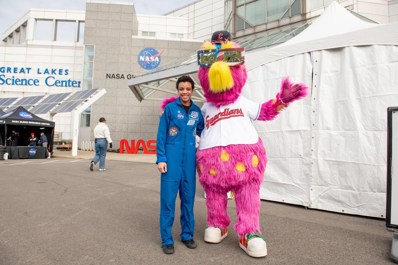 Astronaut Jessica Watkins and the Cleveland Guardians mascot, Slider pose together at Total Solar Eclipse Fest at the Great Lakes Science Center on April 6, 2024. A total solar eclipse swept across a narrow portion of the North American continent from Mexico’s Pacific coast to the Atlantic coast of Newfoundland, Canada. A partial solar eclipse was visible across the entire North American continent along with parts of Central America and Europe.