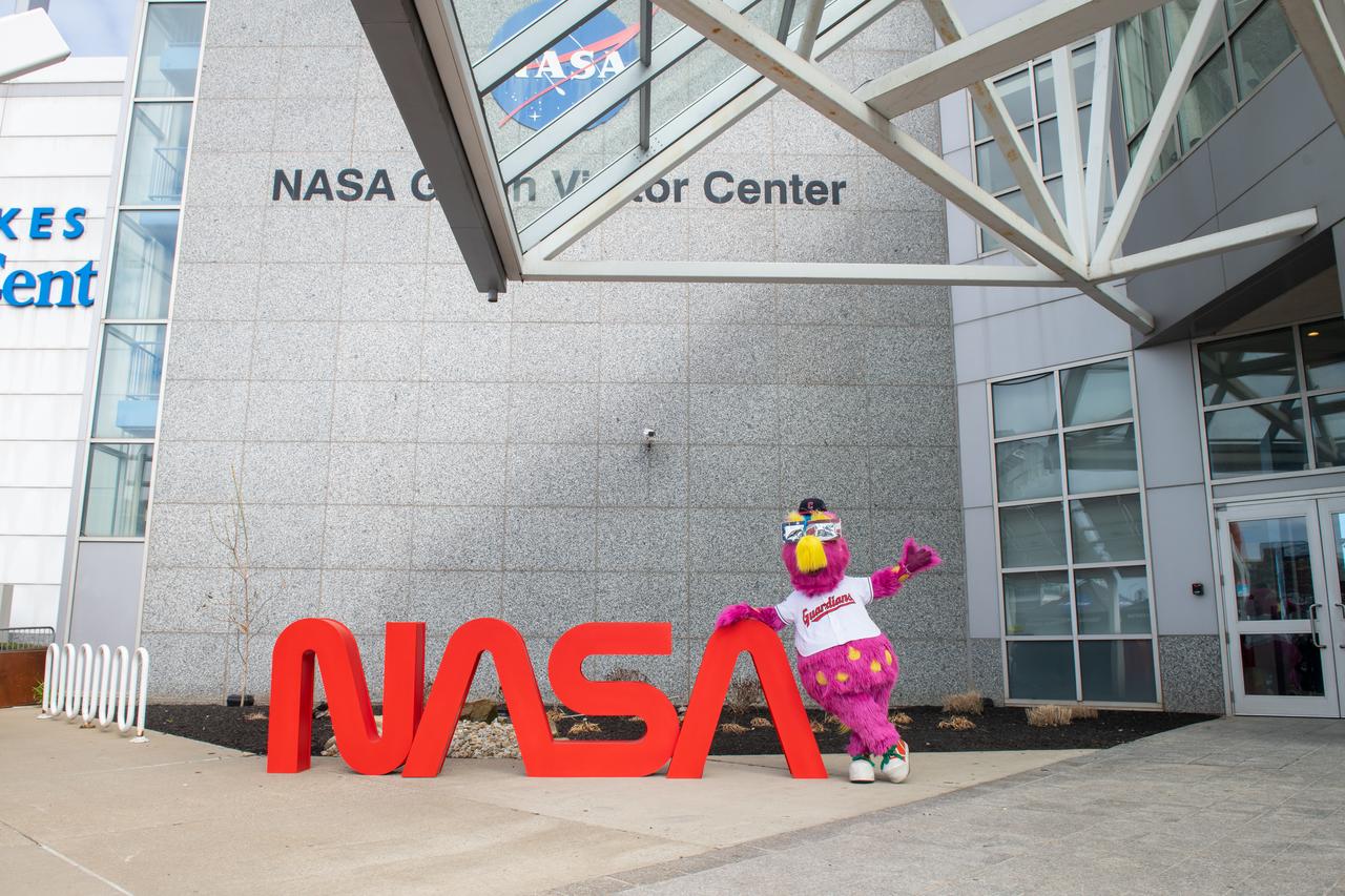 The Cleveland Guardians mascot, Slider poses in front of the NASA sign at the Total Solar Eclipse Fest at the Great Lakes Science Center April 6, 2024. A total solar eclipse swept across a narrow portion of the North American continent from Mexico’s Pacific coast to the Atlantic coast of Newfoundland, Canada. A partial solar eclipse was visible across the entire North American continent along with parts of Central America and Europe.