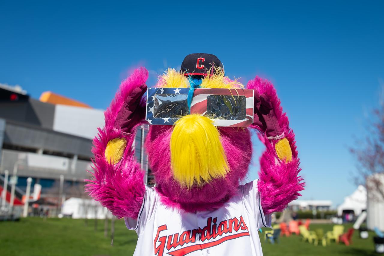 The Cleveland Guardians mascot, Slider poses with solar eclipse glasses at the Total Solar Eclipse Fest at the Great Lakes Science Center April 6, 2024. A total solar eclipse swept across a narrow portion of the North American continent from Mexico’s Pacific coast to the Atlantic coast of Newfoundland, Canada. A partial solar eclipse was visible across the entire North American continent along with parts of Central America and Europe.