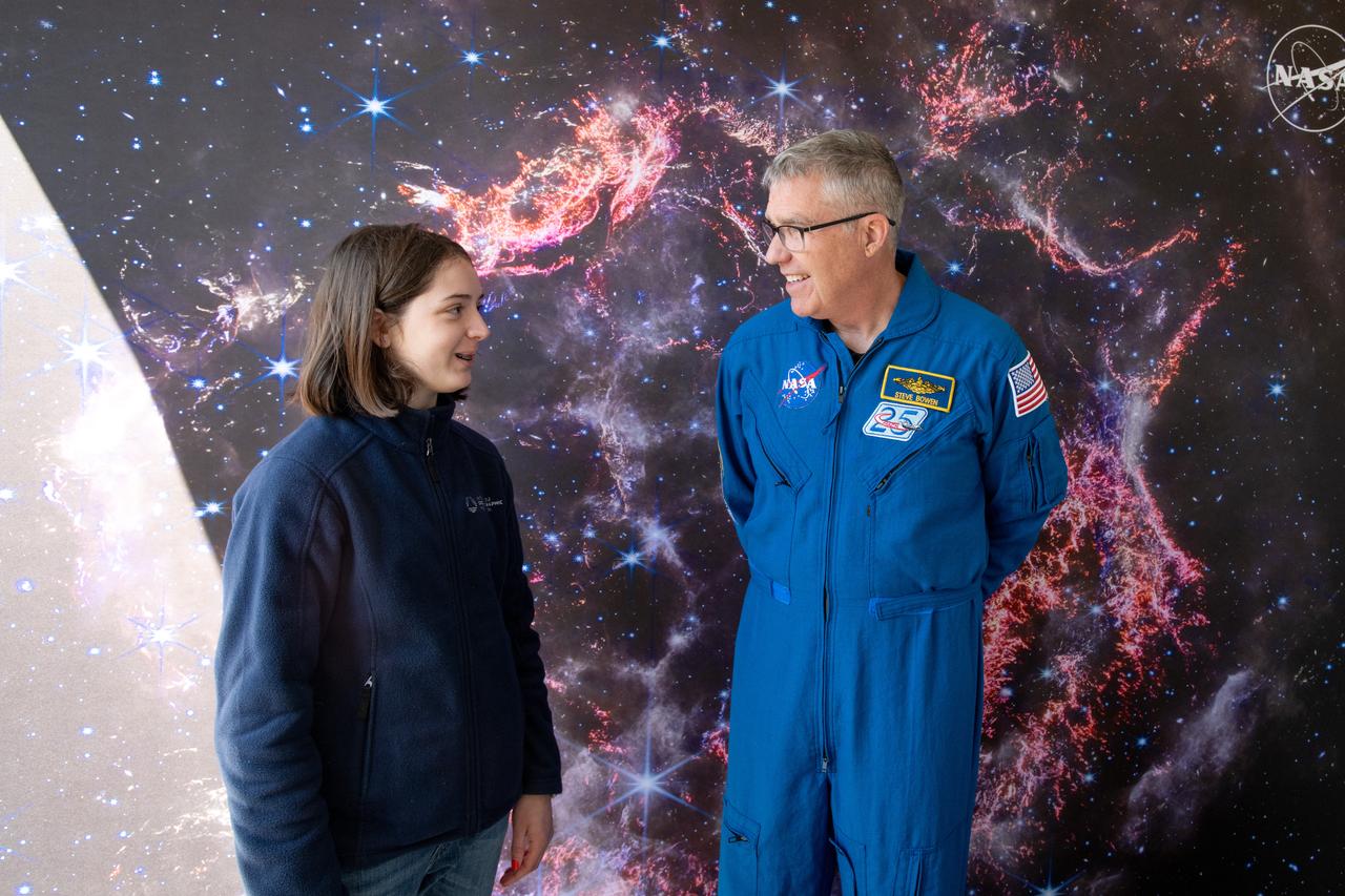 A guest interacts with Astronaut Stephen Bowen during meet and greets at the Total Eclipse Fest at the Great Lakes Science Center in Cleveland, OH on April 6, 2024. A total solar eclipse swept across a narrow portion of the North American continent from Mexico’s Pacific coast to the Atlantic coast of Newfoundland, Canada. A partial solar eclipse was visible across the entire North American continent along with parts of Central America and Europe.