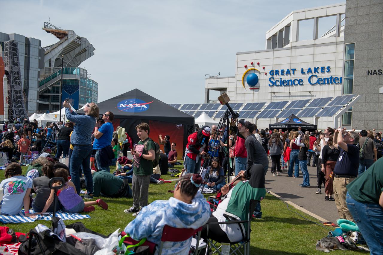 Event attendees view the eclipse. NASA Glenn Research Center and the Great Lakes Science Center hosted a three-day celestial celebration in downtown Cleveland, OH. This free, outdoor, family-friendly science and arts festival will feature free concerts, performances, speakers, and hands-on science activities with community partners. A total solar eclipse swept across a narrow portion of the North American continent from Mexico’s Pacific coast to the Atlantic coast of Newfoundland, Canada. A partial solar eclipse was visible across the entire North American continent along with parts of Central America and Europe. 