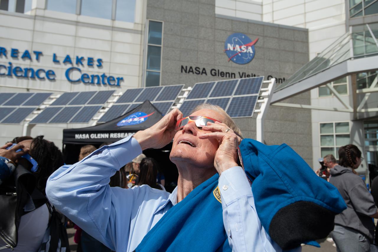 Administrator Bill Nelson views the eclipse safetly with solar eclipse glasses.  NASA Glenn Research Center and the Great Lakes Science Center hosted a three-day celestial celebration in downtown Cleveland, OH. This free, outdoor, family-friendly science and arts festival will feature free concerts, performances, speakers, and hands-on science activities with community partners. A total solar eclipse swept across a narrow portion of the North American continent from Mexico’s Pacific coast to the Atlantic coast of Newfoundland, Canada. A partial solar eclipse was visible across the entire North American continent along with parts of Central America and Europe. 