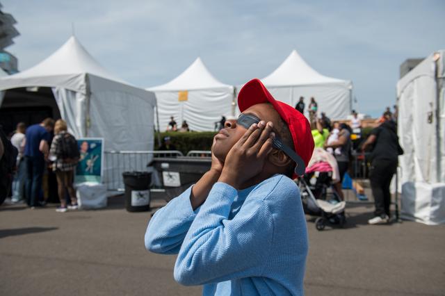 NASA image: Child Viewing the Total Solar Eclipse