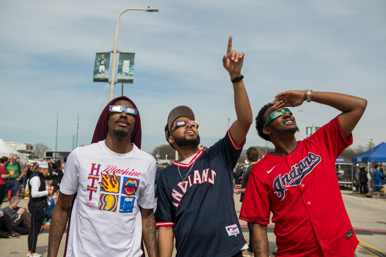 Event attendees view the eclipse. NASA Glenn Research Center and the Great Lakes Science Center hosted a three-day celestial celebration in downtown Cleveland, OH. This free, outdoor, family-friendly science and arts festival will feature free concerts, performances, speakers, and hands-on science activities with community partners. A total solar eclipse swept across a narrow portion of the North American continent from Mexico’s Pacific coast to the Atlantic coast of Newfoundland, Canada. A partial solar eclipse was visible across the entire North American continent along with parts of Central America and Europe. Photo Credit: (NASA/Jef Janis)