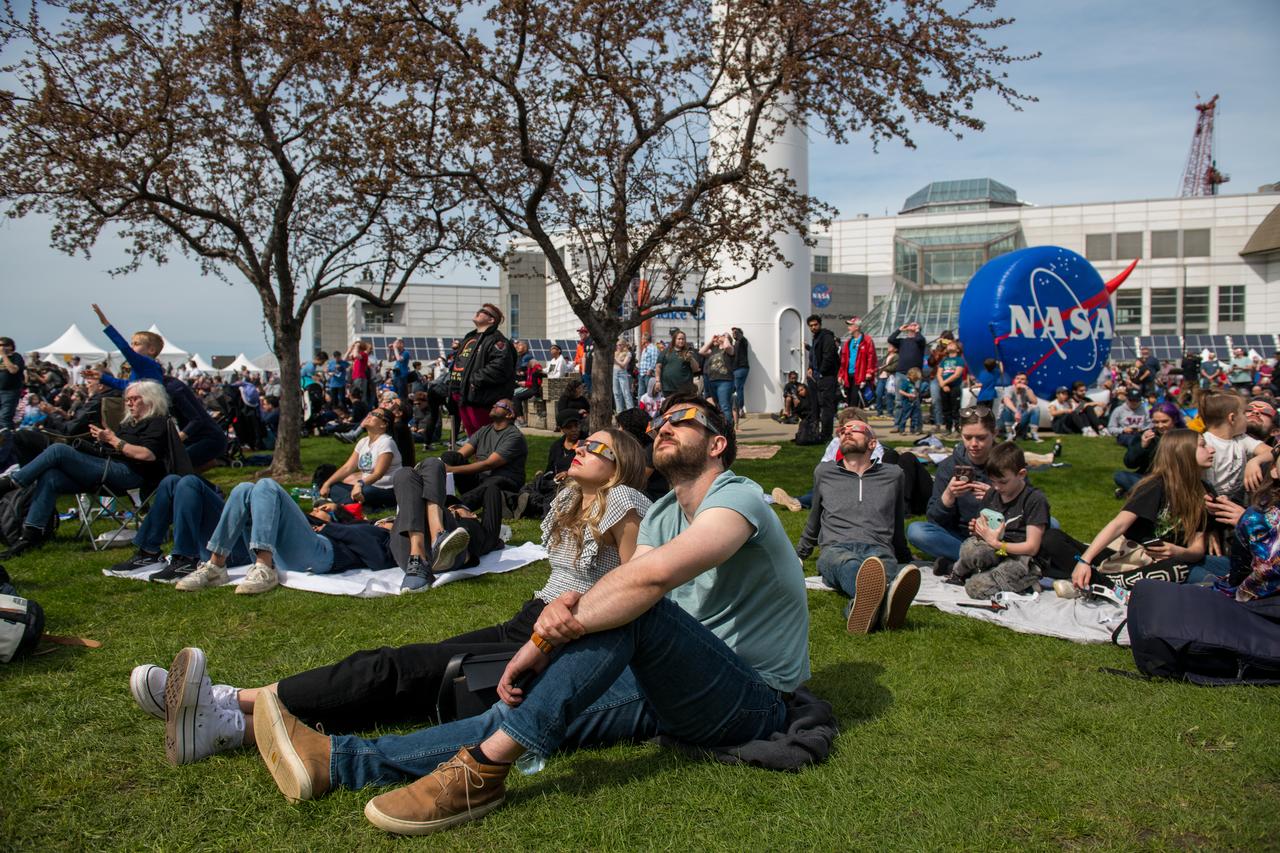 Event attendees view the eclipse. NASA Glenn Research Center and the Great Lakes Science Center hosted a three-day celestial celebration in downtown Cleveland, OH. This free, outdoor, family-friendly science and arts festival will feature free concerts, performances, speakers, and hands-on science activities with community partners. A total solar eclipse swept across a narrow portion of the North American continent from Mexico’s Pacific coast to the Atlantic coast of Newfoundland, Canada. A partial solar eclipse was visible across the entire North American continent along with parts of Central America and Europe. 