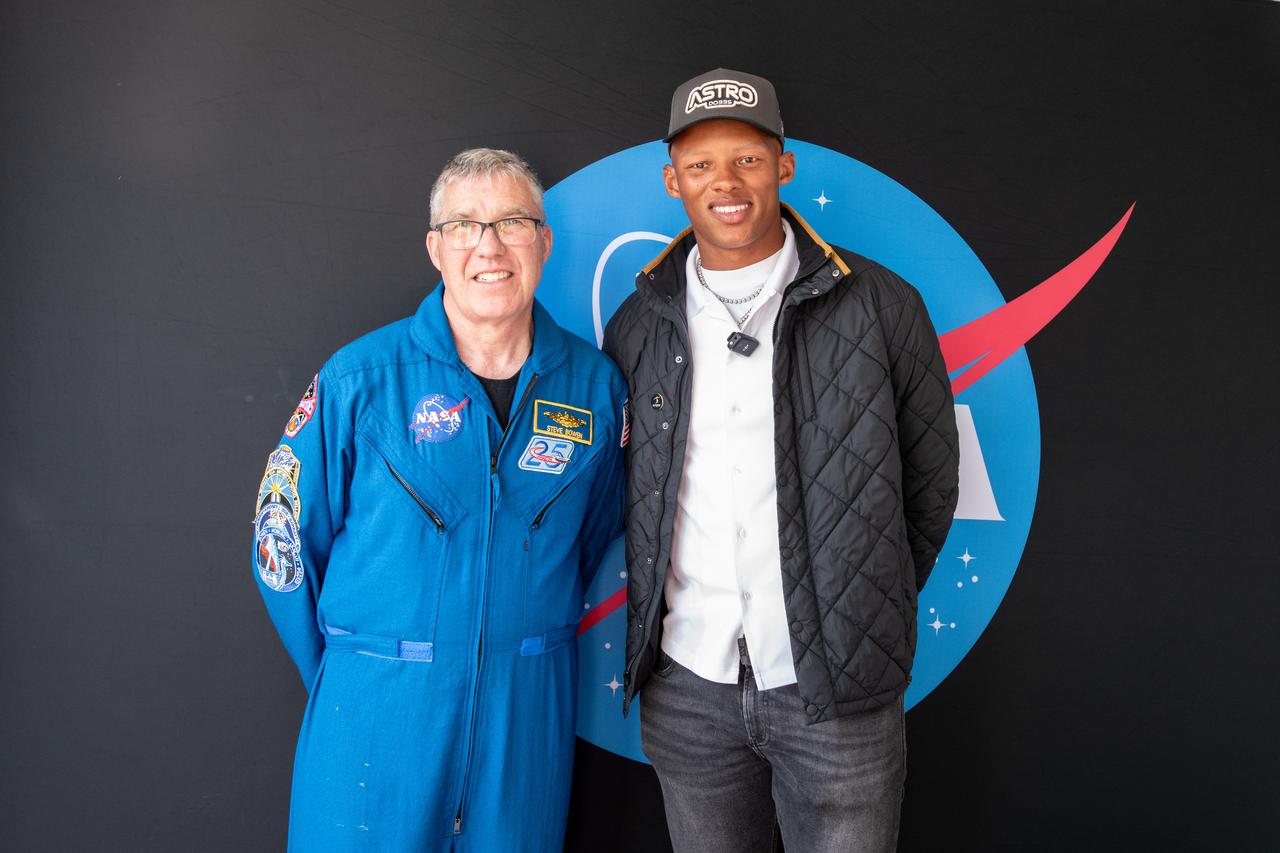 Astonaut Stephen Bowen and Josh Dobbs pose for a photo together at Total Eclipse fest. They both participated in meet and greets with the community.   This free, outdoor, family-friendly science and arts festival will feature free concerts, performances, speakers, and hands-on science activities with community partners. A total solar eclipse swept across a narrow portion of the North American continent from Mexico’s Pacific coast to the Atlantic coast of Newfoundland, Canada. A partial solar eclipse was visible across the entire North American continent along with parts of Central America and Europe. 