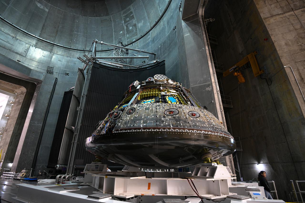 The Orion CM (Crew Module) or Orion ETA (Environmental Test Article) is passed through the vacuum chamber on its way to get ready for two critical tests in preparation for the Artemis II flight.  There will be a jettison test of the Docking Module and a jettison test of the Forward Bay Cover.