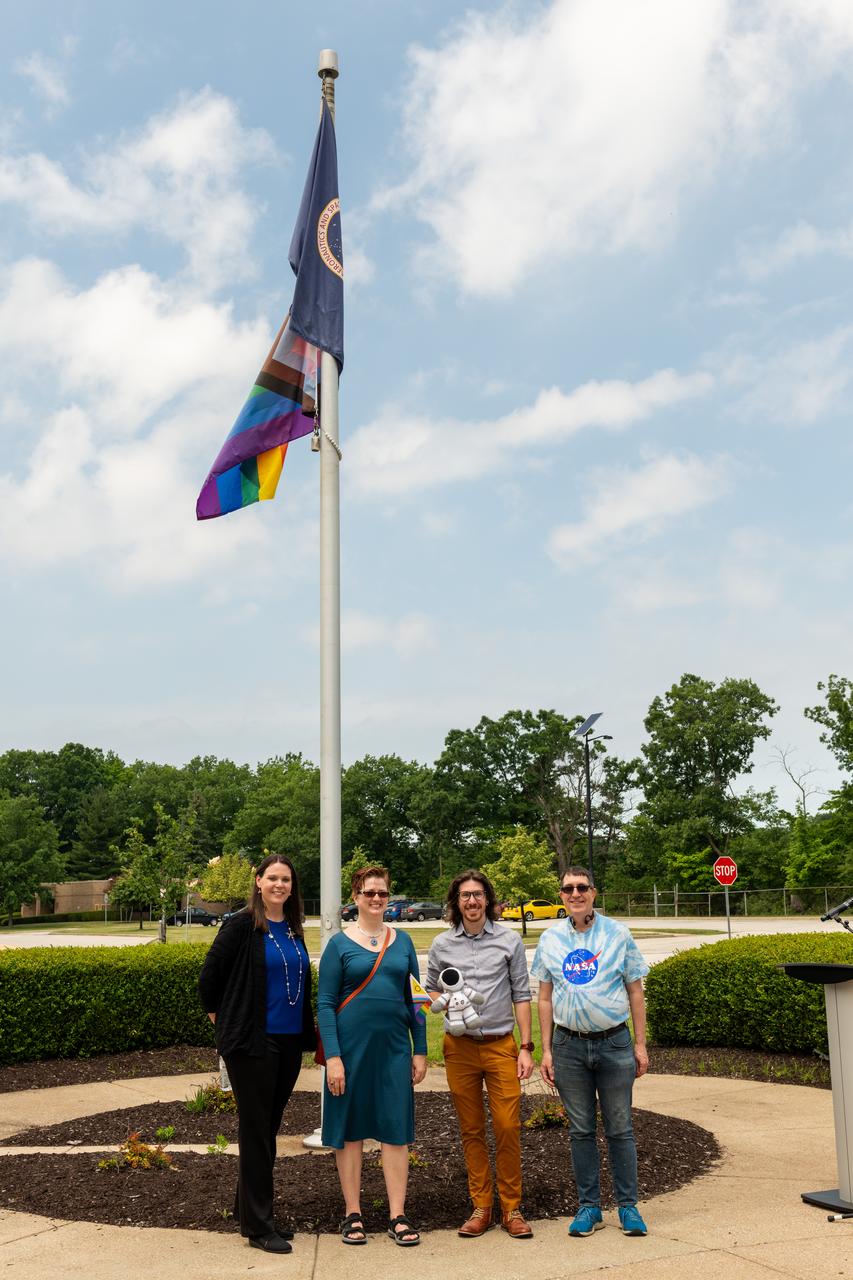 NASA Glenn’s Rainbow Alliance Advisory Group hosted an in-person and livestreamed Pride flag raising ceremony at the building 3 flagpole on June 3, 2024. The event included remarks from Deputy Director Dawn Schaible and NASA Safety Center Director Harmony Myers.  Flag raising events such as this are times for LGBTQ+ employees and their allies to come together to celebrate the progress made in the quest for safety, tolerance, acceptance, rights, happiness, and freedom for the LGBTQ+ community on- and off-site of the center.  Pictured here is NASA Safety Center Director Harmony Myers, Rainbow Alliance Advisory Group Co-Chairs Matthew Huffman and Jessica Reinert and John Wolter. 
