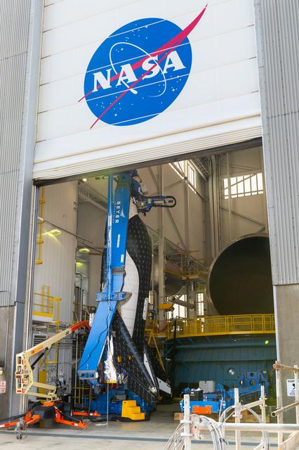 NASA image: The Sierra Space Plane, Dream Chaser, is ready to be lifted into