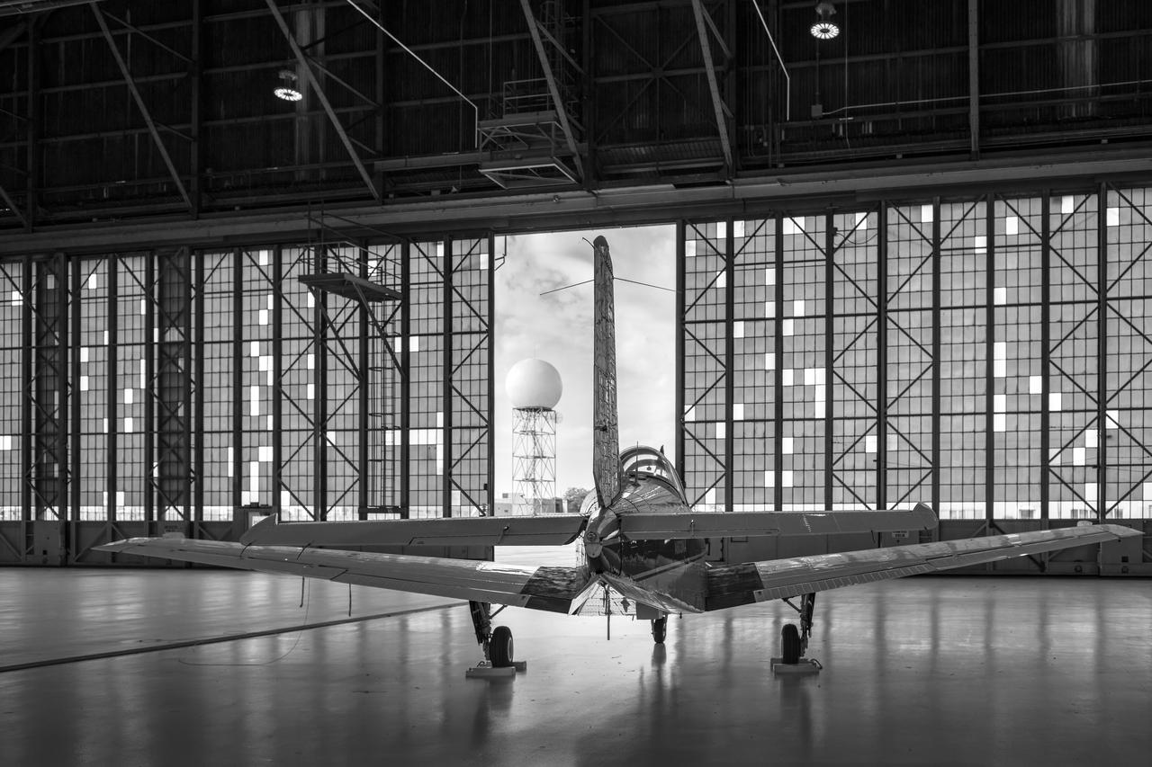 The NASA T-34 Plane, waiting to take flight inside the NASA Glenn Research Center Hanger. Photographer: Jef Janis- NASA Glenn Research Center          