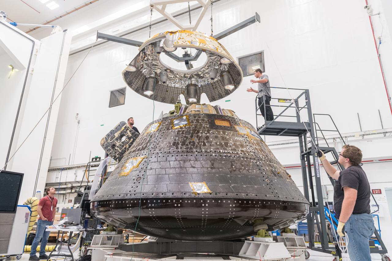 The Orion Crew Module, also known as the Orion Environmental Test Article (ETA), prepares for testing by installing the Forward Bay Cover. The Crew Module returned to NASA’s Neil Armstrong Test Facility in Sandusky, Ohio, in January 2024 and completed an 11-month test campaign necessary for the safety and success of Artemis II. Photo Credit: (NASA/Jordan Salkin)