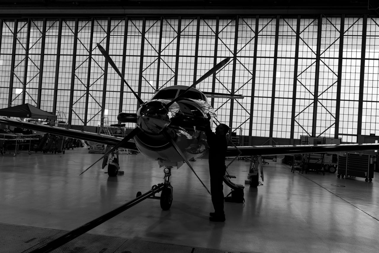 Pilatus PC-12 Aircraft Being Prepped for Takeoff on June 12, 2024. A team at NASA’s Glenn Research Center in Cleveland streamed 4K video footage from an aircraft to the International Space Station and back for the first time using optical, or laser, communications. The feat was part of a series of tests on new technology that could provide live video coverage of astronauts on the Moon during the Artemis missions. Working with the Air Force Research Laboratory and NASA’s Small Business Innovation Research program, Glenn engineers temporarily installed a portable laser terminal on the belly of a Pilatus PC-12 aircraft. They then flew over Lake Erie sending data from the aircraft to an optical ground station in Cleveland. From there, it was sent over an Earth-based network to NASA’s White Sands Test Facility in Las Cruces, New Mexico, where scientists used infrared light signals to send the data. Photo Credit: (NASA/Sara Lowthian-Hanna)