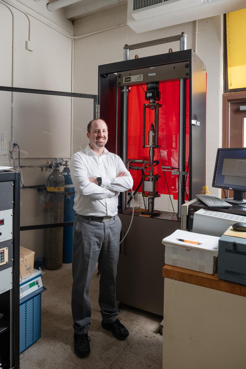 Each year, the NESC produces the NESC Technical Update, which highlights two or three individuals from each Center and includes assessments throughout the year. Because of the critical contributions to the NESC mission this year, Rob Jankovsky, NESC Chief Engineer at GRC, chose two individuals to be highlighted.   This year, it is Andrew Ring and Michael Cooper.  Mr. Ring, pictured here,  performs stress and fatigue testing on all manner of materials in various environments and research on jet engine materials, looking for ways to increase the performance and safety of turbine blades and disks. Several NESC assessments have benefited from his expertise, most recently in understanding crack initiation and propagation in the aluminum-magnesium alloys that make up the modules of the ISS. He has also used image processing techniques to quantify the variables in parachute energy modulator production and performance and investigate flaws in the composite weave of overwrapped pressure vessels. 