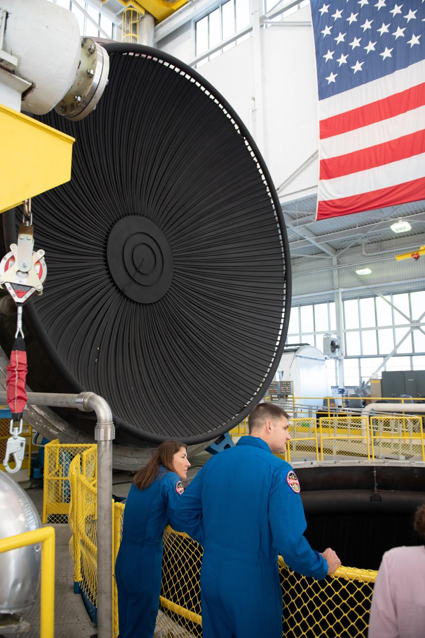 Tours were given of the In Space Propulsion Facility (ISP). NASA’s Facility is the world’s only high altitude test facility capable of full-scale rocket engine and launch vehicle system level tests. The facility supports mission profile thermal vacuum simulation and engine firing.  Pictured are Mission Specialists Christina Koch and Jeremy Hansen.   Employees meet three of the four astronauts who will venture around the Moon on Artemis II, the first crewed flight paving the way for future lunar surface missions. Commander Reid Wiseman and Mission Specialists Christina Koch and Jeremy Hansen will be on hand to discuss their upcoming mission and participate in a Question and Answer session with employees afterward. Hansen is an astronaut with the Canadian Space Agency. Victor Glover, the pilot and fourth crew member, was not present. Photo Credit: (NASA/Sara Lowthian-Hanna)