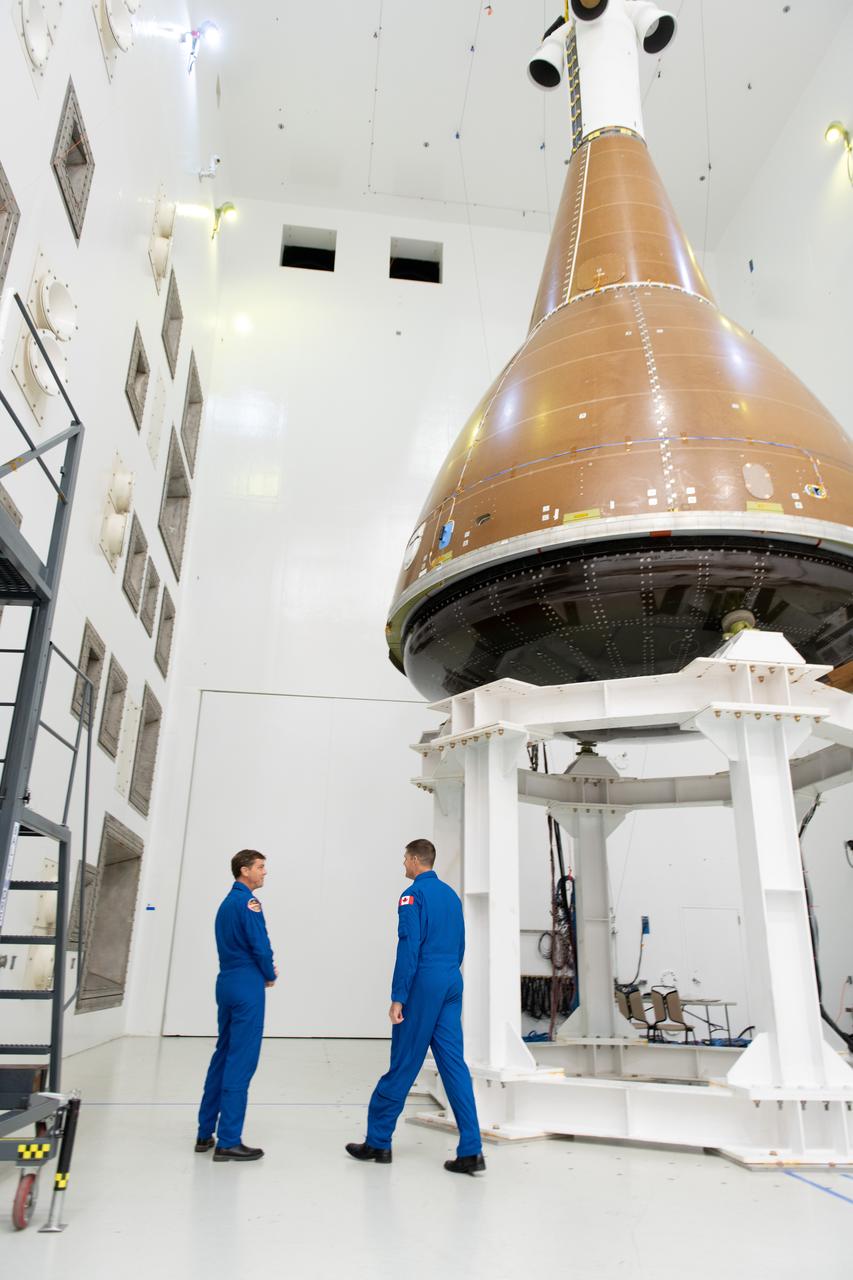 The team at NASA's Armstrong Test Facility in Sandusky, Ohio has begun vibro-acoustic testing on the Orion spacecraft that flew around the Moon on Artemis I, now known as the Environmental Test Article. The testing will help ensure the safety of future crews aboard Orion.  Commander Reid Wiseman and Mission Specialist Jeremy Hansen look around during tours of the acoustic lab.