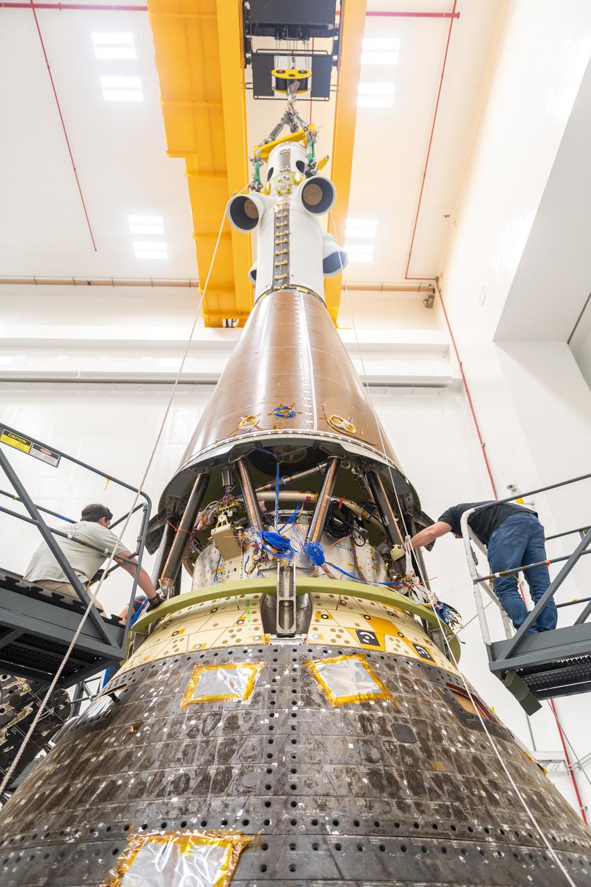 The Launch Abort Systems gets installed on to the Orion Crew Module, also known as the Orion Environmental Test Article (ETA), in preparation for testing at the Space Environments Complex at NASA’s Neil Armstrong Test Facility in Sandusky, Ohio. The ETA completed an 11-month test campaign in 2024 necessary for the safety and success of Artemis II. Photo Credit: (NASA/Jordan Salkin)
