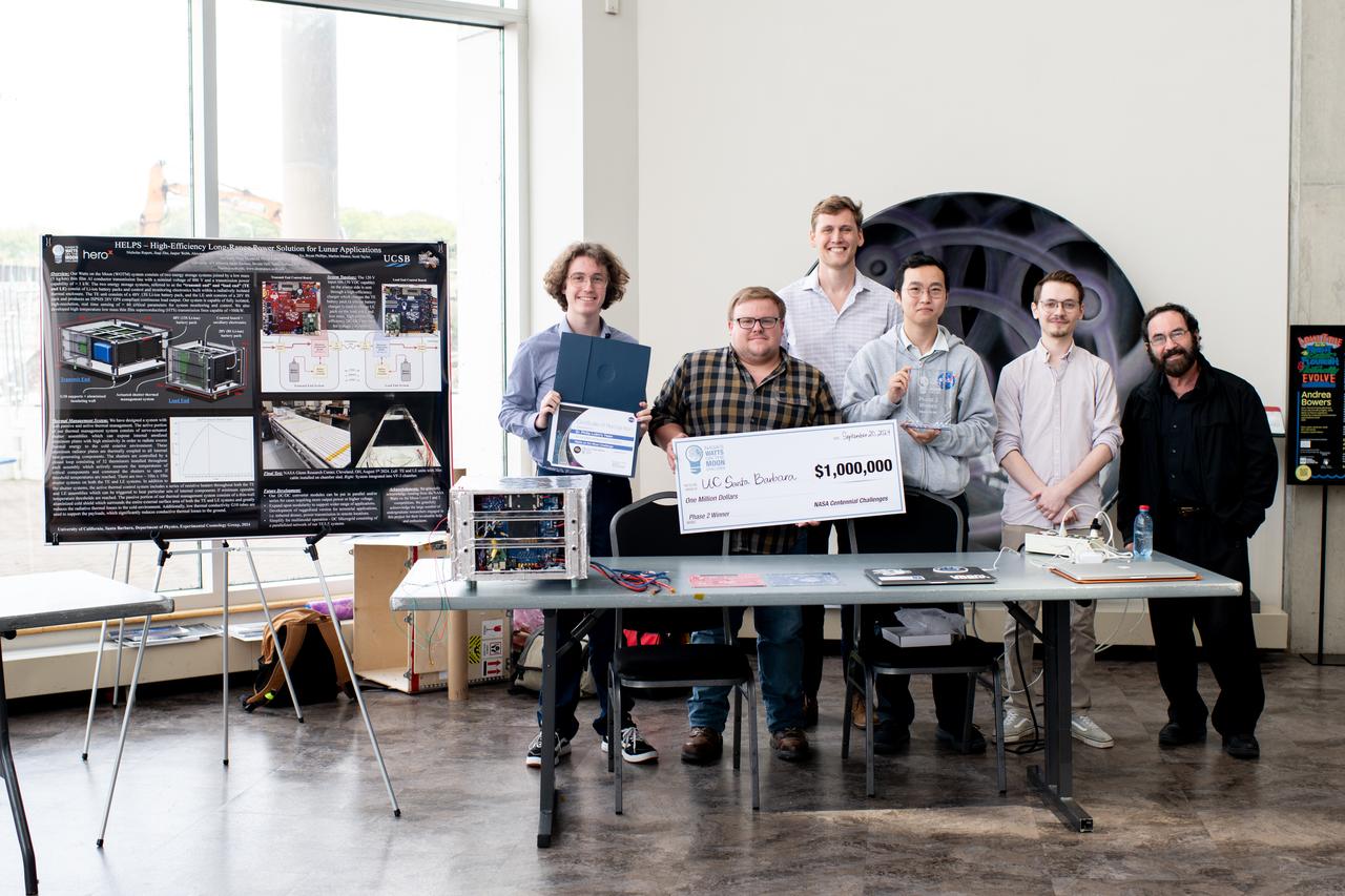 NASA has awarded a total of $1.5 million to two U.S. teams for their novel technology solutions addressing energy distribution, management, and storage as part of the agency’s Watts on the Moon Challenge. The innovations from this challenge aim to support NASA’s Artemis missions, which will establish long-term human presence on the Moon.  This two-phase competition has challenged U.S. innovators to develop breakthrough power transmission and energy storage technologies that could enable long-duration Moon missions to advance the nation’s lunar exploration goals. The final phase of the challenge concluded with a technology showcase and winners’ announcement ceremony Friday at Great Lakes Science Center, home of the visitor center for NASA’s Glenn Research Center in Cleveland.  Team H.E.L.P.S. (High Efficiency Long-Range Power Solution) from The University of California, Santa Barbara won the $1 million grand prize in NASA’s Watts on the Moon Challenge. Their team developed a low-mass, high efficiency cable and featured energy storage batteries on both ends of their power transmission and energy storage system.  Second prize ($500,000): Orbital Mining Corporation of Golden, Colorado